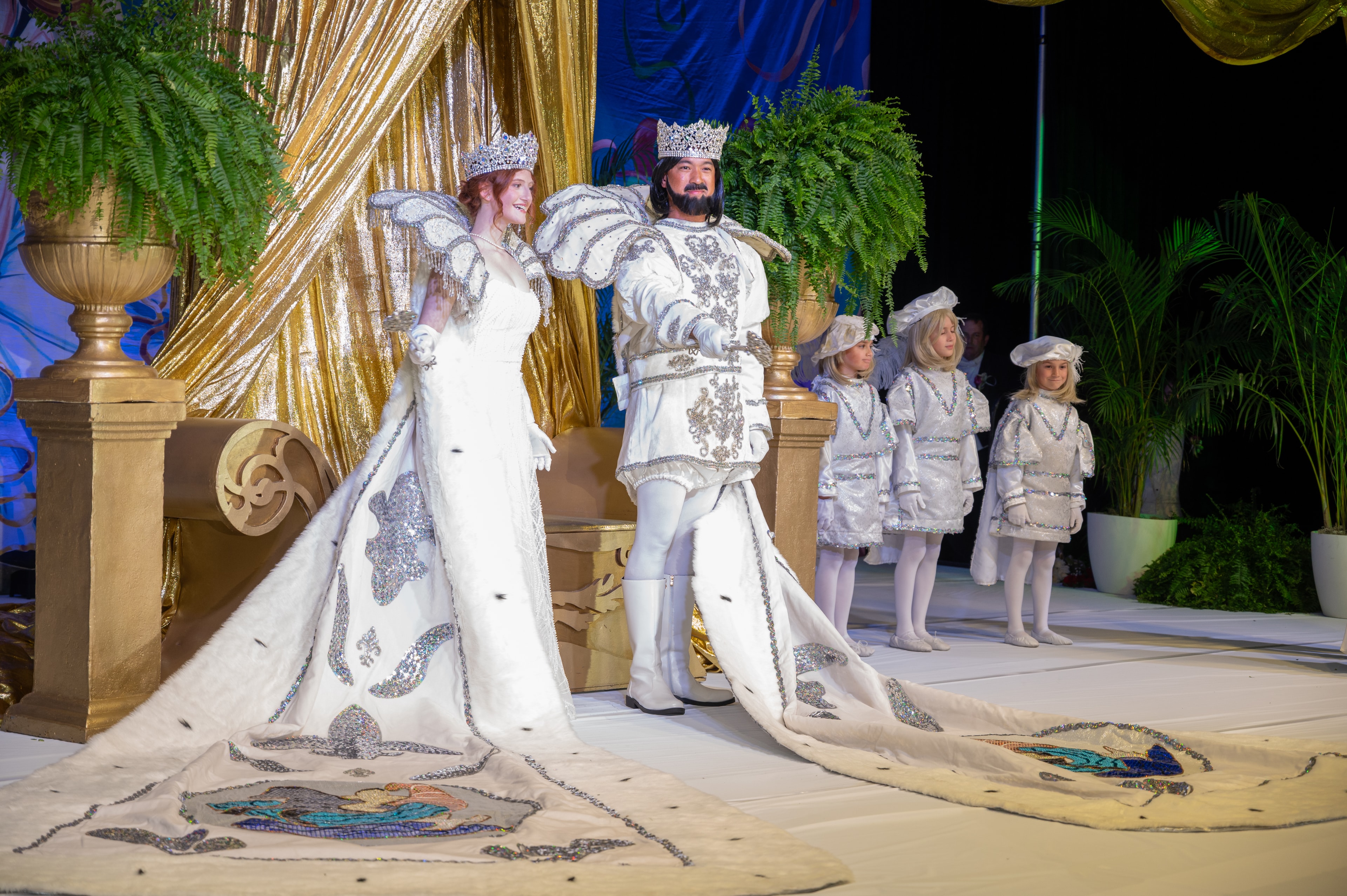 Coronation Ball theatrical costumes performers on stage
