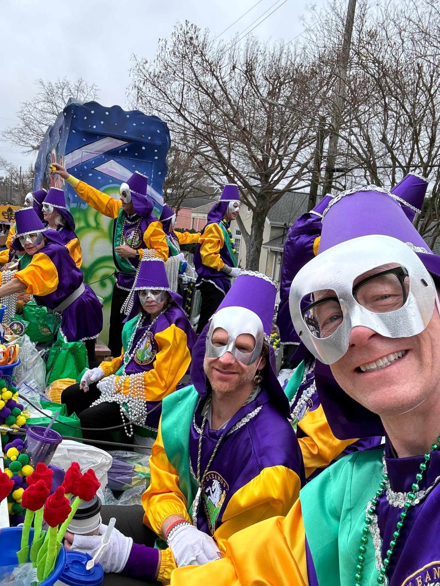 Mardi Gras parade float colorful crowd St. Charles Avenue