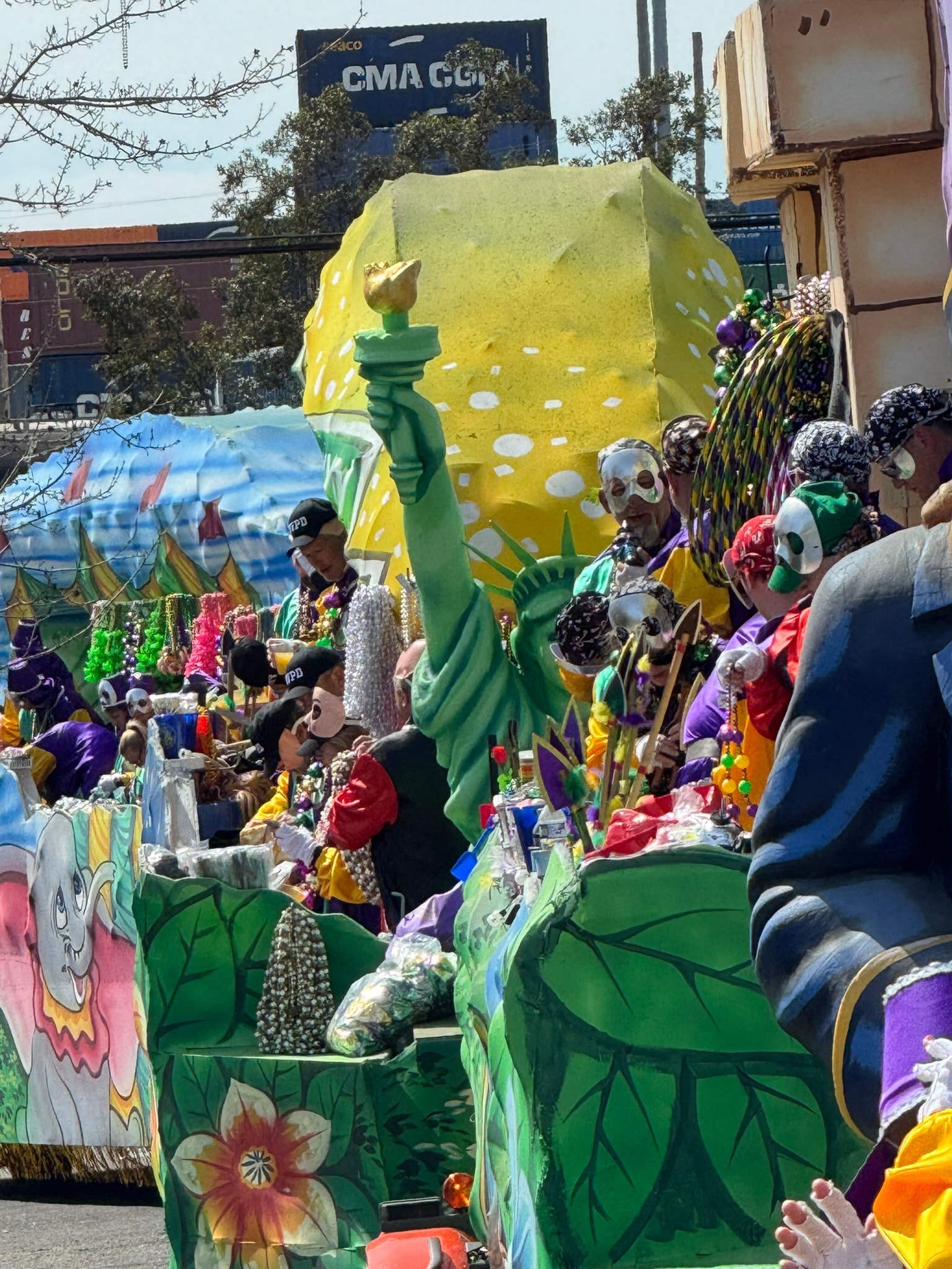 Mardi Gras crowd catching beads parade